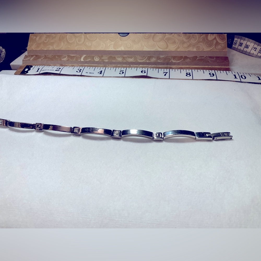 Silver tone bracelet with cz